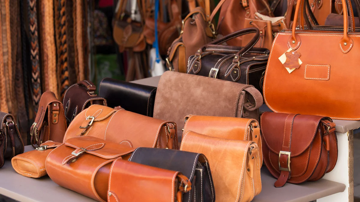 hand-stitching handcrafted leather bag